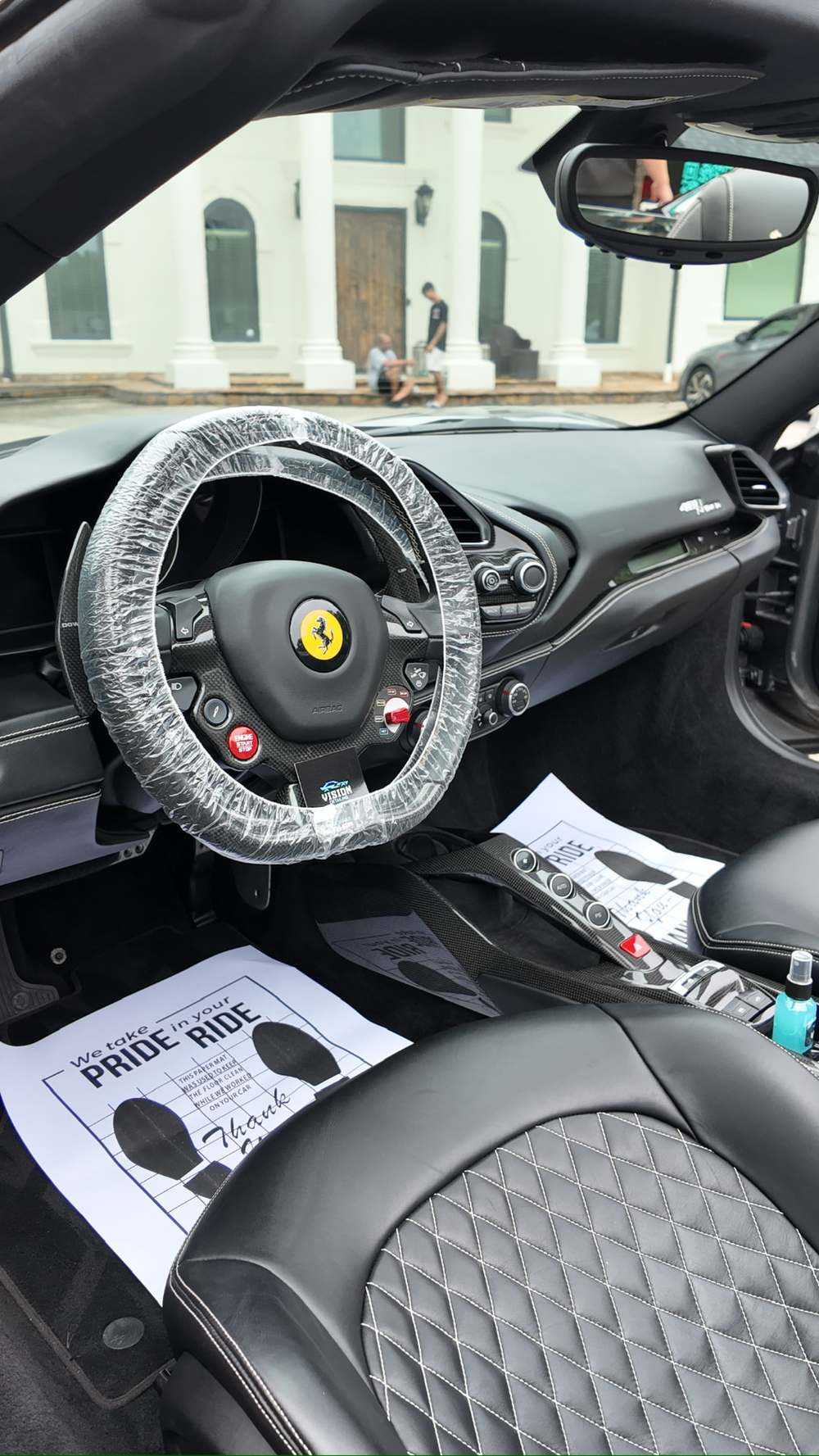 Protected interior of a Ferrari during a Vision Detailing appointment